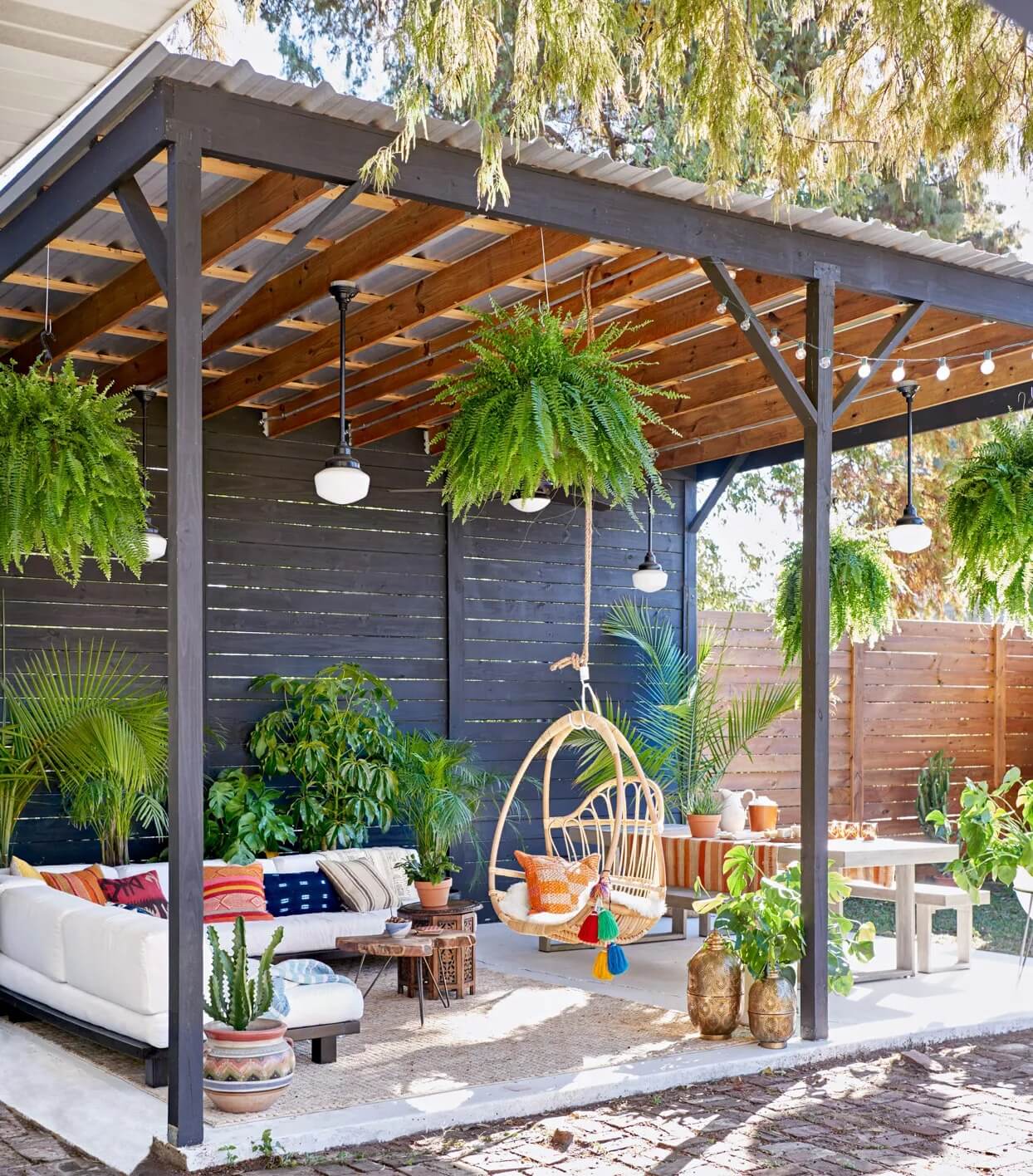 Cement patio black pergola