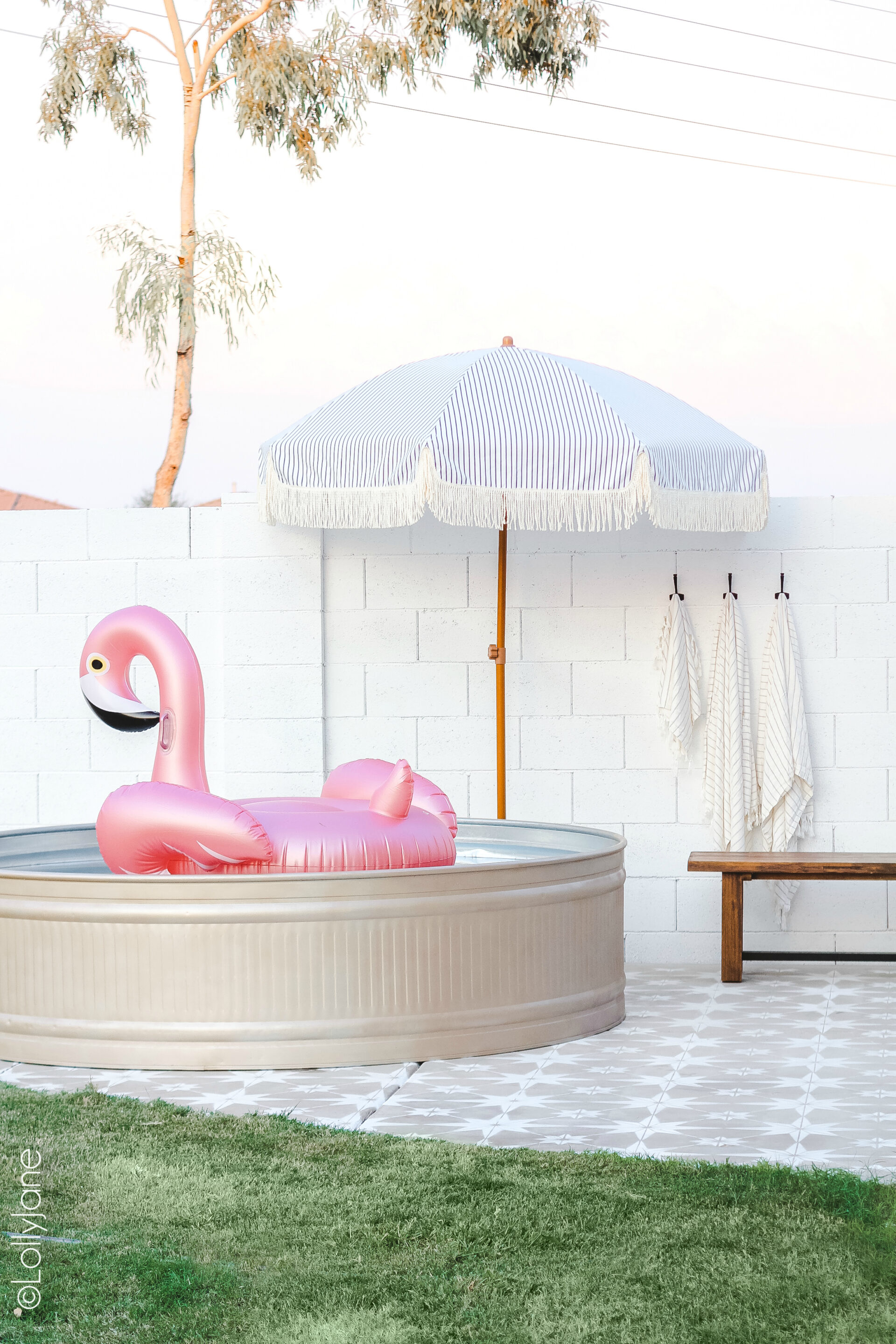Backyard with a stock tank pool