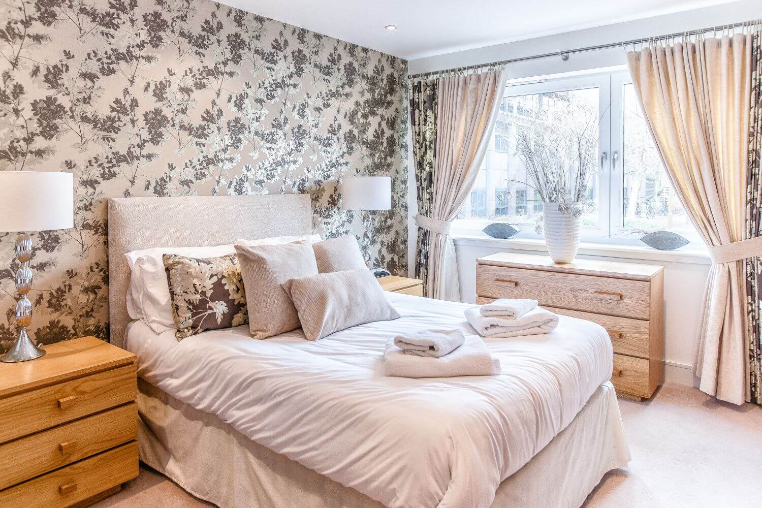 bedroom with floral wall paper