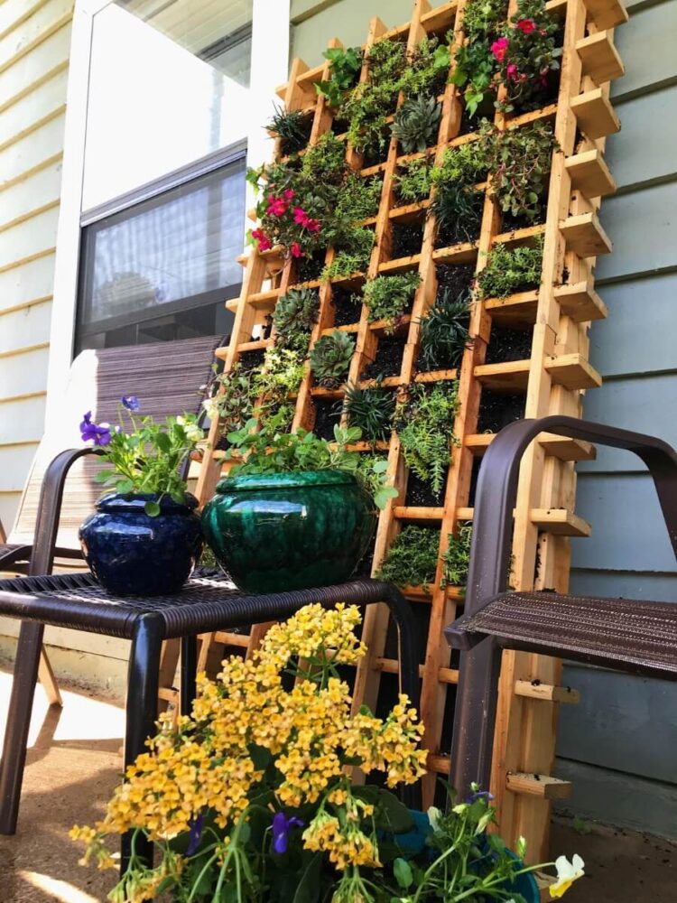 upcycled wine rack garden with chicken wire backing